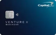 Capital One Venture X Business credit card on a dark blue gradient background.