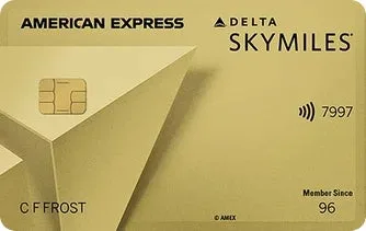 Gold American Express Delta SkyMiles credit card on a plain background.