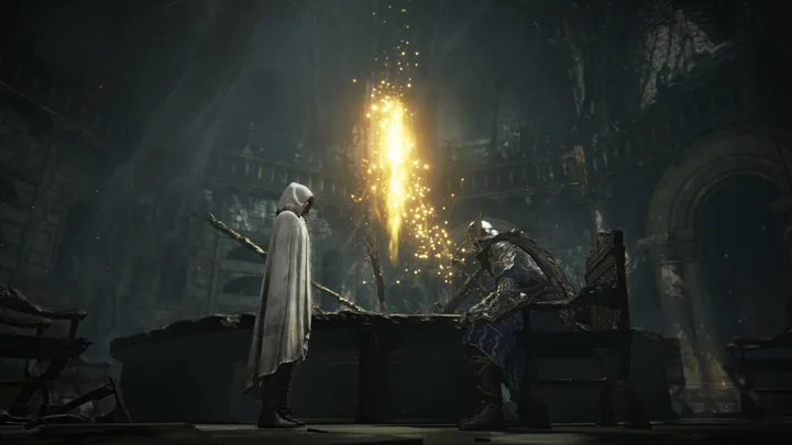Two cloaked figures face each other across a chest emitting a golden light beam inside a gothic hall.