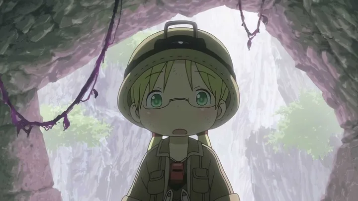 A young anime girl explorer in a helmet looks up with wide eyes inside a dark cave tunnel.