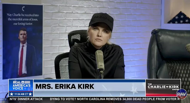 Erika Kirk seated at microphone on The Charlie Kirk Show, lower-third reads 'Mrs. Erika Kirk'.