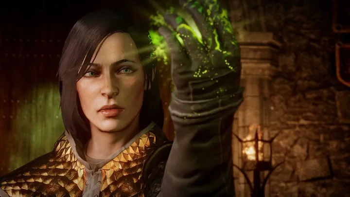 Fantasy video game female character in golden armor channeling green magical energy in a stone chamber.