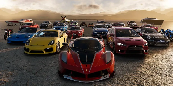 Large collection of detailed sports cars and vehicles arranged on a dry lakebed at dusk.
