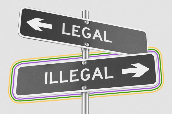 Two street signs pointing opposite directions labeled 'Legal' and 'Illegal' on a pole.
